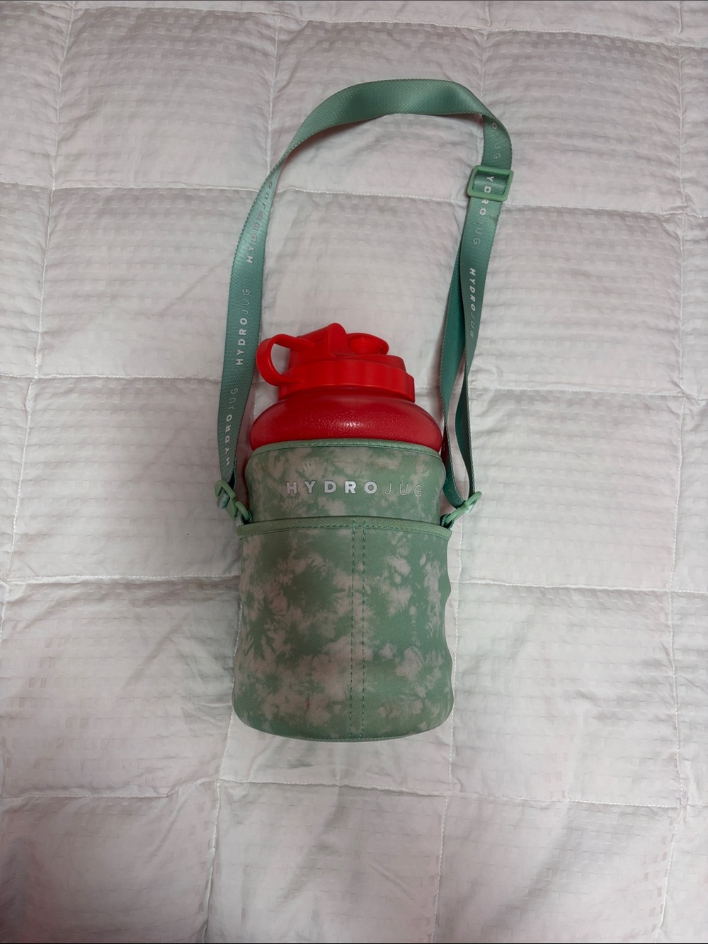 HydroJug Mint Green Crossbody Bottle Carrier with pink 2.2 liter Bottle